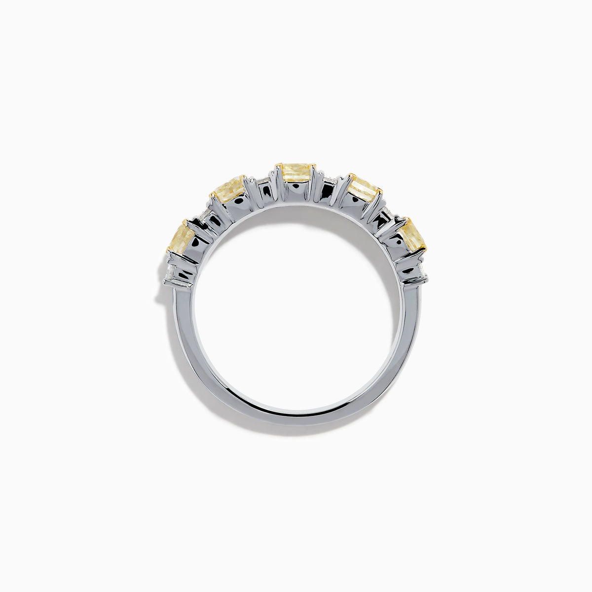 The Canare 18K Two Tone Gold White and Yellow Gold Diamond Band Ring features alternating rectangular yellow and clear diamonds set in a row along the band, shown on a white background.