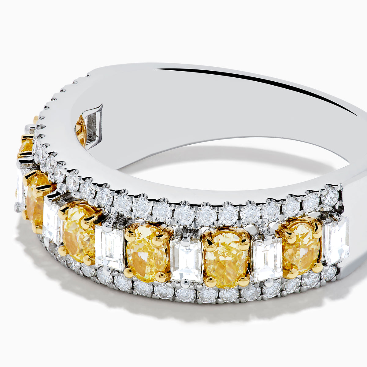 An 18K Two Tone Gold White and Yellow Diamond Wide Band Ring featuring a row of rectangular yellow diamonds bordered by two rows of small round white diamonds, shown on a white background.