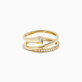 The 14K Yellow Gold Diamond Wrap Ring features two intertwined bands—one with a pear-shaped clear gemstone, the other accented by sparkling round diamonds along the top half—for an elegant, dazzling look.