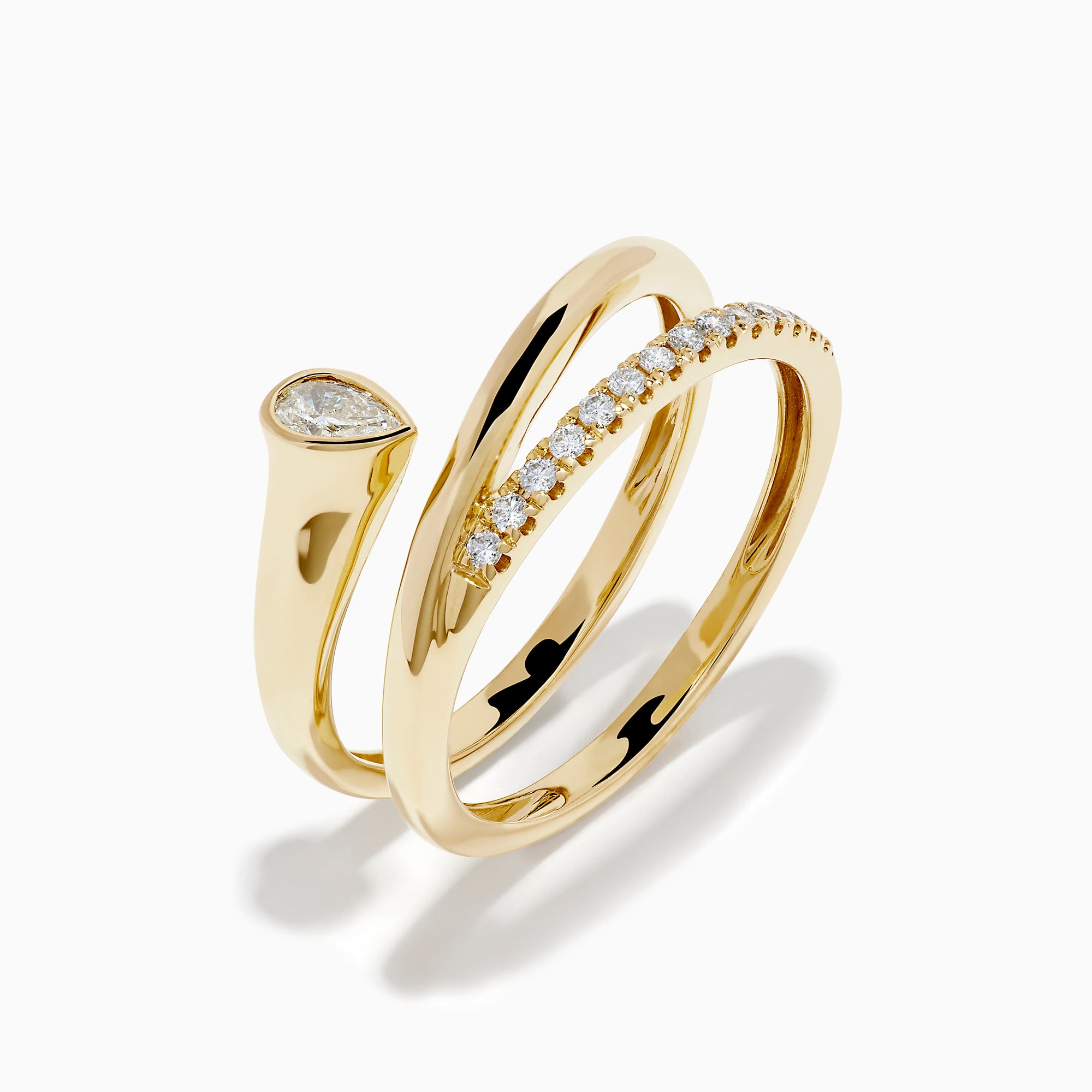 The 14K Yellow Gold Diamond Wrap Ring features two intertwined bands—one with a pear-shaped clear gemstone, the other accented by sparkling round diamonds along the top half—for an elegant, dazzling look.