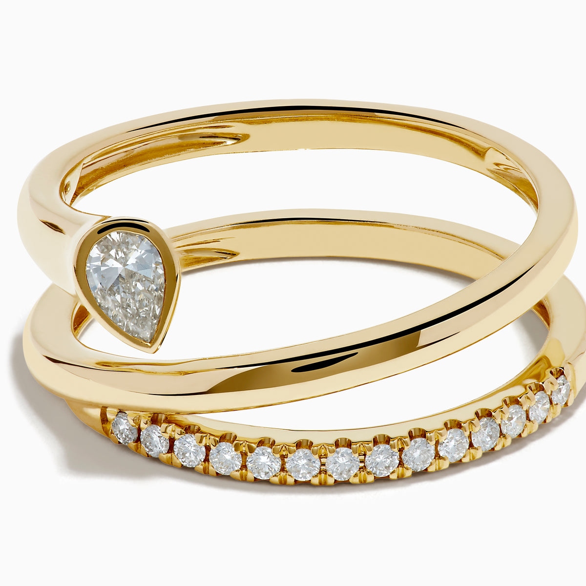 The 14K Yellow Gold Diamond Wrap Ring features two intertwined bands—one with a pear-shaped clear gemstone, the other accented by sparkling round diamonds along the top half—for an elegant, dazzling look.