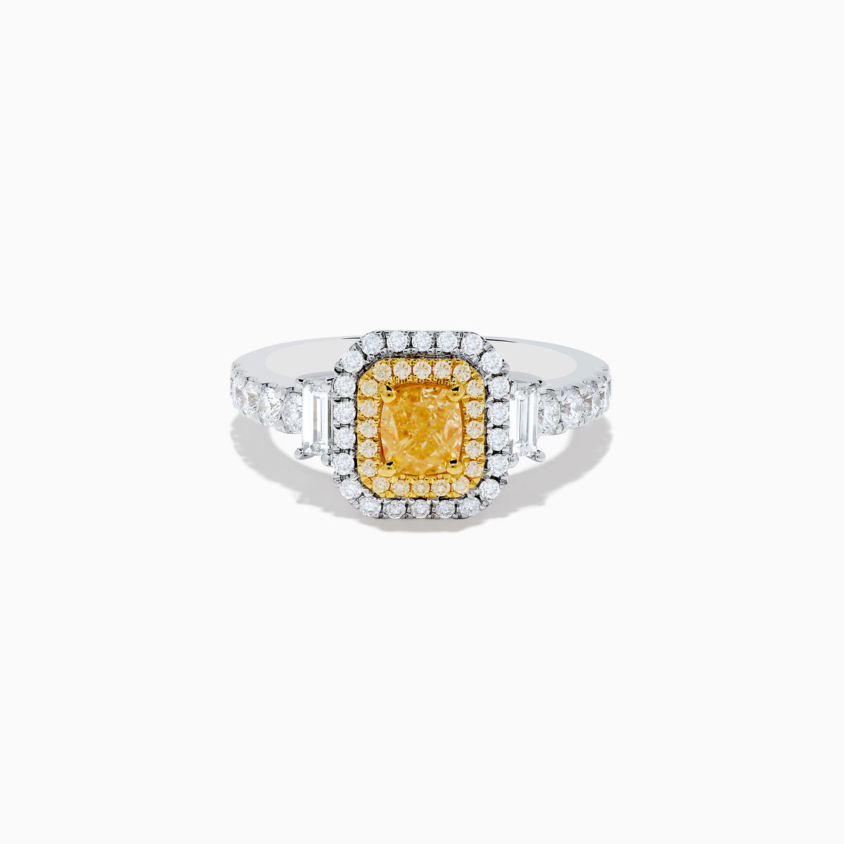The Canare 18K Two Tone Gold White & Yellow Diamond Ring showcases a rectangular yellow gemstone, double halo of white and yellow diamonds, and diamond-accented band—a striking statement piece.
