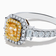 The Canare 18K Two Tone Gold White & Yellow Diamond Ring showcases a rectangular yellow gemstone, double halo of white and yellow diamonds, and diamond-accented band—a striking statement piece.