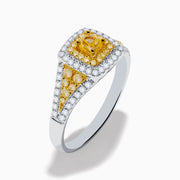 The Canare 18K Two Tone Gold White & Yellow Diamond Ring features a square cluster of yellow diamonds at the center, bordered by small white stones with extra yellow diamonds set on each side of the band.