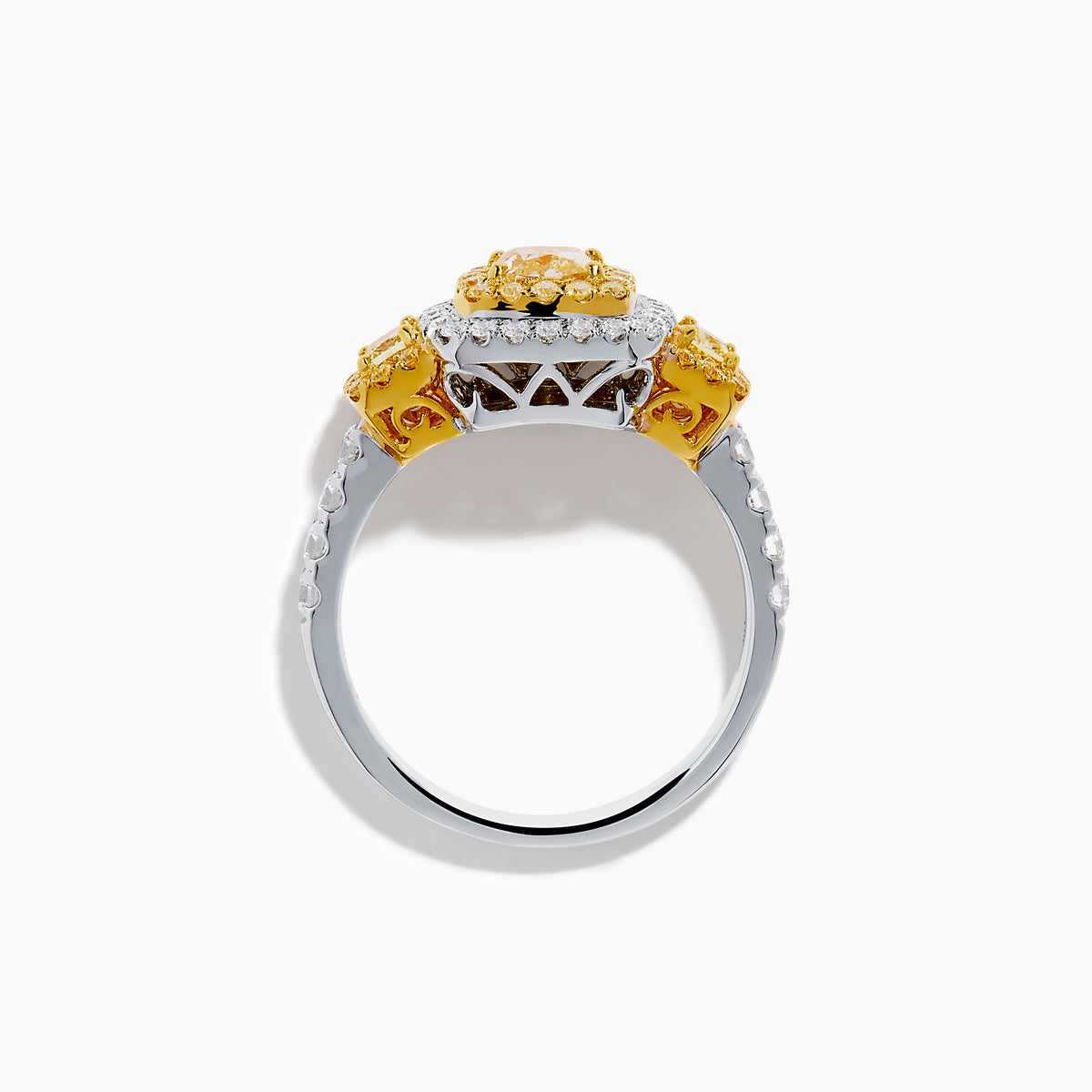 The Canare 18K Two Tone Gold White and Yellow Diamond Ring features a large rectangular yellow diamond center, encircled by rows of yellow and white diamonds, with side yellow diamonds bordered by sparkling white stones.