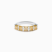 The Canare 18K Two Tone Gold White and Yellow Diamond Band Ring features rectangular yellow and round white diamonds set in prongs along a sleek two-tone gold band.