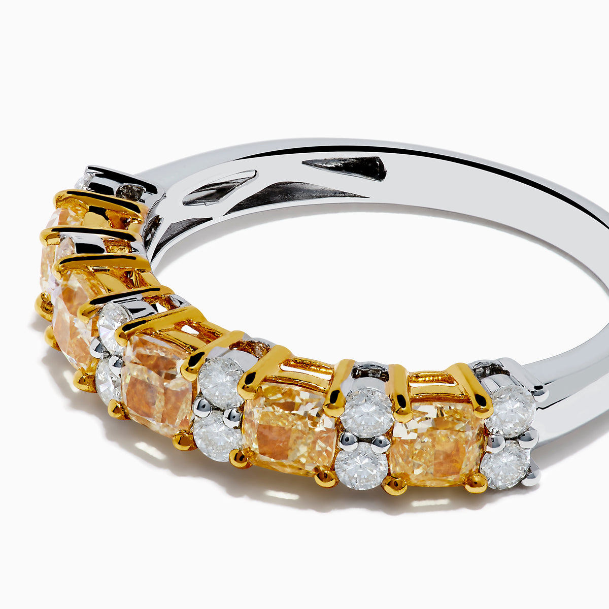 The Canare 18K Two Tone Gold White and Yellow Diamond Band Ring features rectangular yellow and round white diamonds set in prongs along a sleek two-tone gold band.