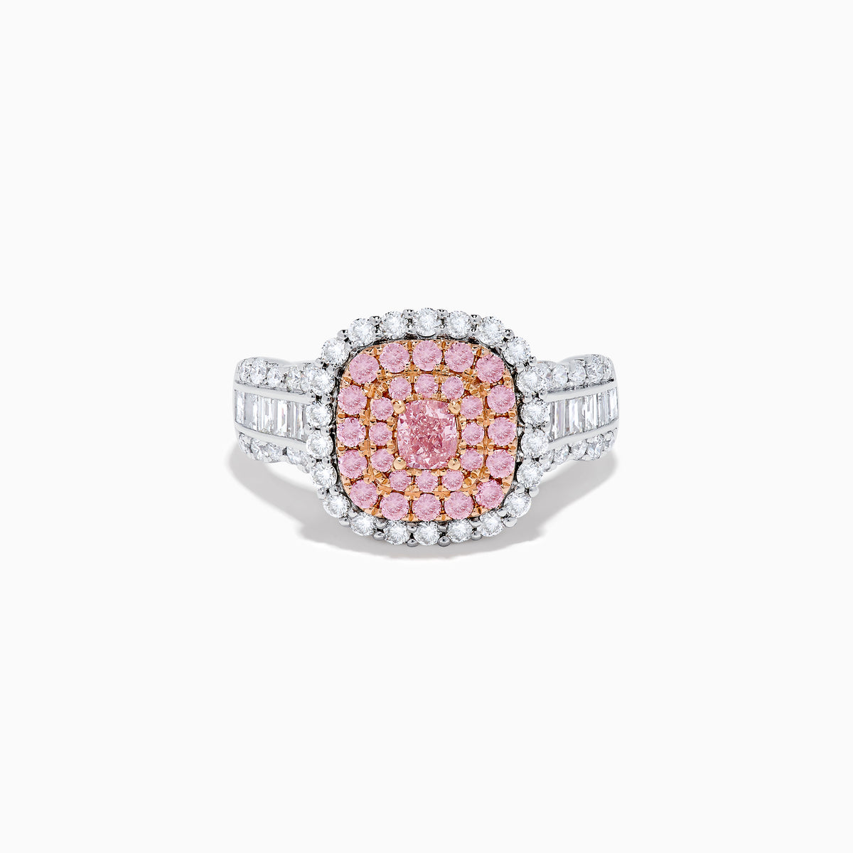 The 18K Two Tone Gold White and Pink Diamond Ring features a cushion-shaped cluster of pink diamonds at the center, encircled by a double halo of white diamonds, with more diamonds set along the band.
