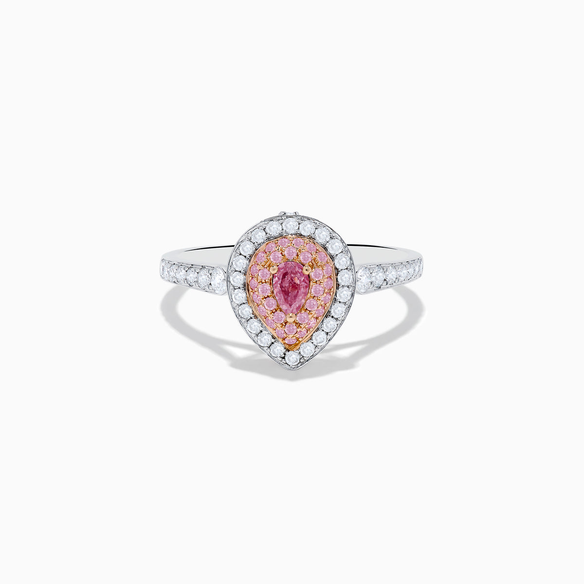 The 18K Two Tone Gold White and Pink Diamond Ring features a teardrop-shaped center with a pink gemstone, surrounded by pink and white stones, set on a band adorned with sparkling white diamonds.