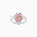 The 18K Two Tone Gold White and Pink Diamond Ring features a teardrop-shaped pink center stone, two rows of pink diamonds, an outer row of white diamonds, and a diamond-adorned band for an elegant look.