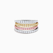 The 18K Three Tone Gold Multi Color Diamond Band Ring features four thin rings in a trio of gold tones, set with clear stones and diamonds, plus a pink stone band for extra charm.