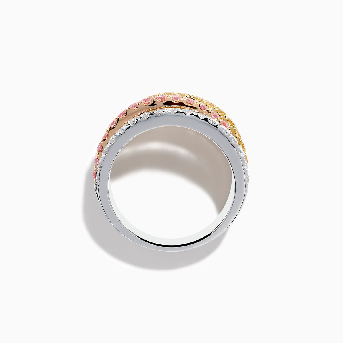 The 18K Three Tone Gold Multi Color Diamond Band Ring features four thin rings in a trio of gold tones, set with clear stones and diamonds, plus a pink stone band for extra charm.