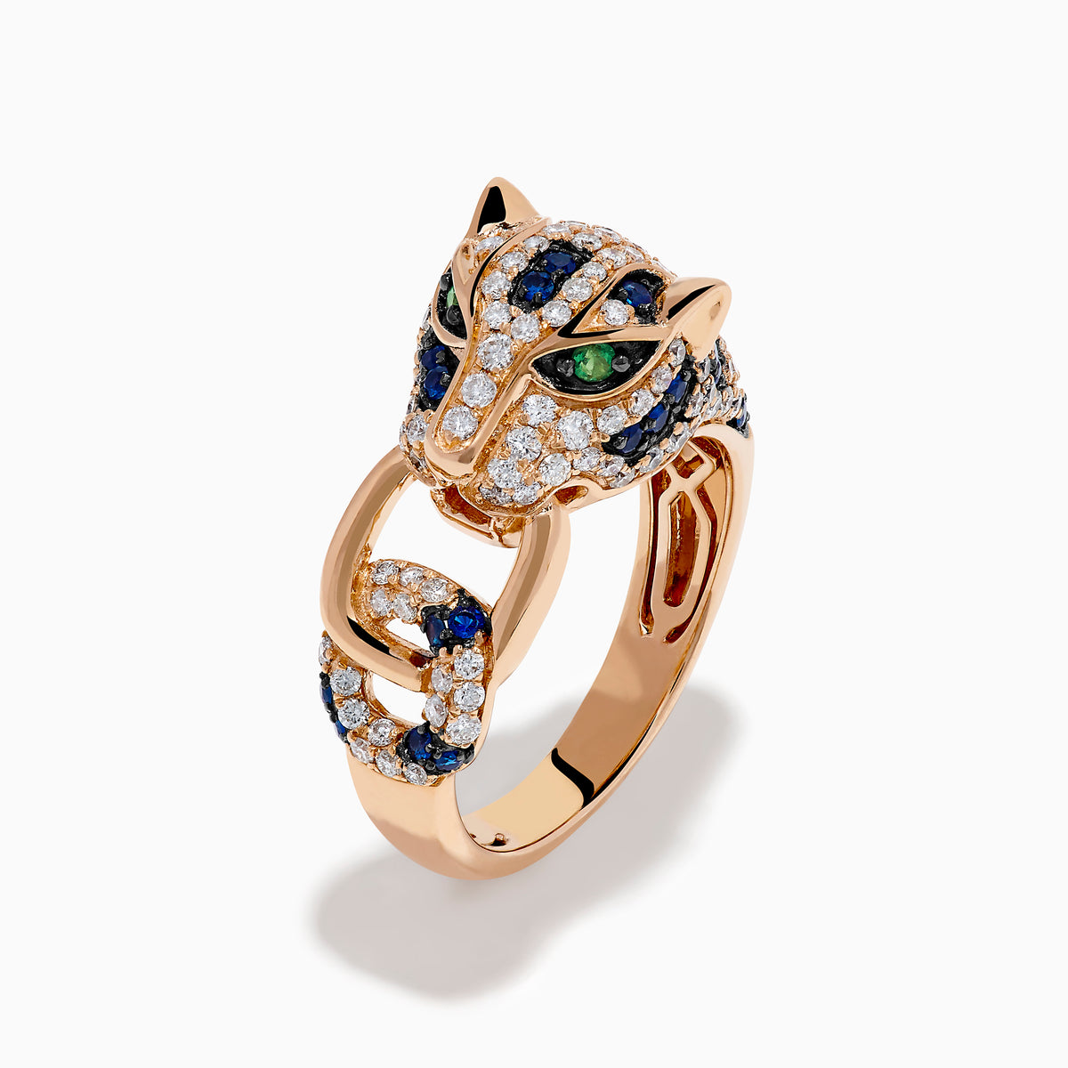 The Signature 14K Rose Gold Diamond, Sapphire and Emerald Ring features a panther’s head encrusted with white diamonds, blue sapphires, and green emeralds, with the panther biting a ring in its mouth.