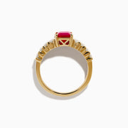The Ruby Royale 14K Yellow Gold Ruby and Diamond Ring features a rectangular red ruby center, accented by three rows of small round diamonds on each side, all showcased against a white background.