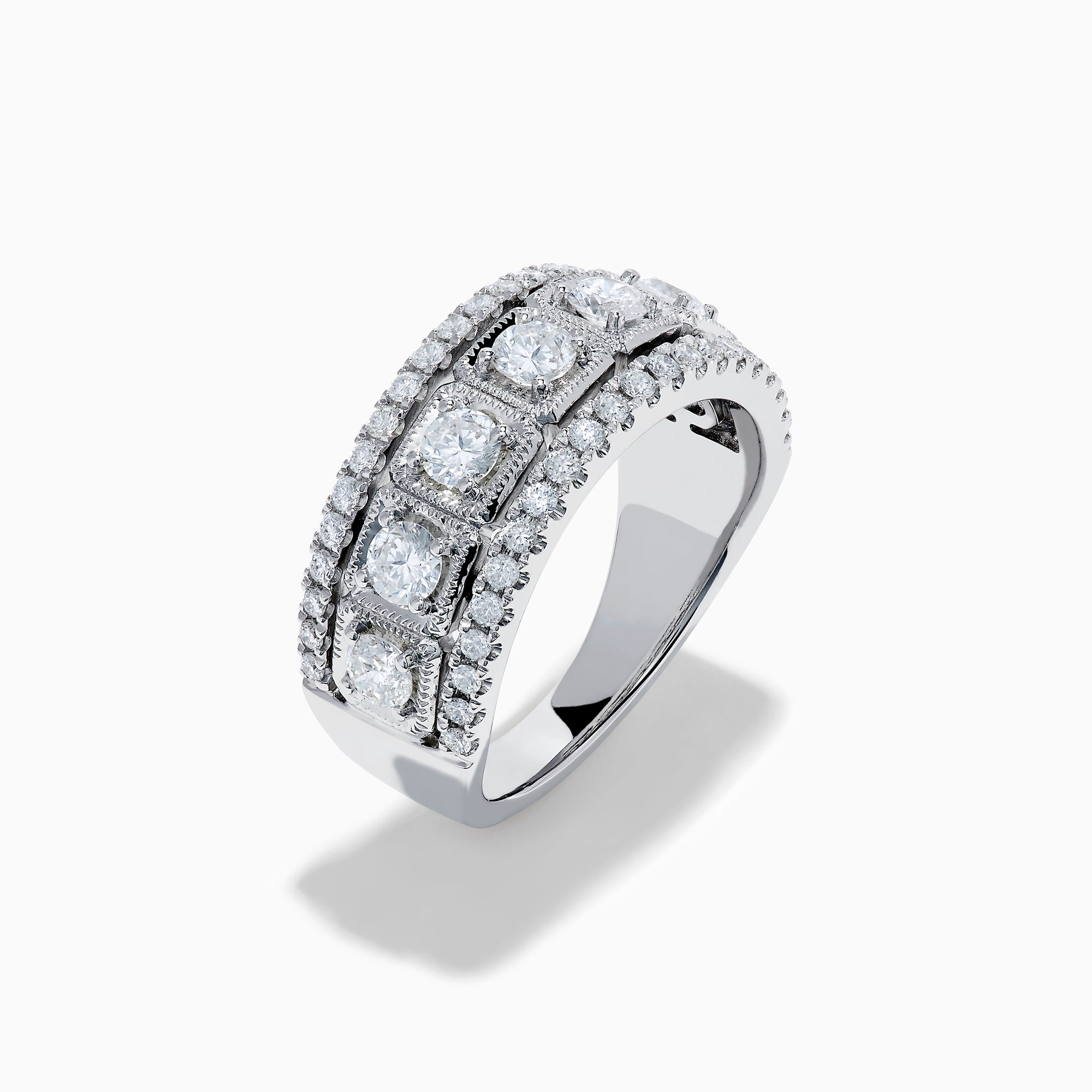 The Classique 14K White Gold Diamond Ring features large round diamonds in square frames, bordered by rows of smaller diamonds, all beautifully crafted in shining 14K white gold.