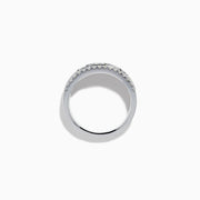 The 14K White Gold Channel Set Diamond Wide Band Ring features three rows of round diamonds, with five larger channel-set stones in the center and smaller diamonds on either side, creating an elegant, eye-catching look.