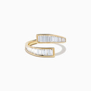 The D'Oro 14K Yellow Gold Diamond Bypass Ring features an open-ended design with parallel rows of rectangular baguette-cut diamonds along the edges, displayed on a white background.