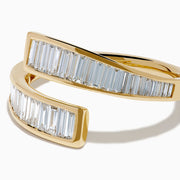 The D'Oro 14K Yellow Gold Diamond Bypass Ring features an open-ended design with parallel rows of rectangular baguette-cut diamonds along the edges, displayed on a white background.