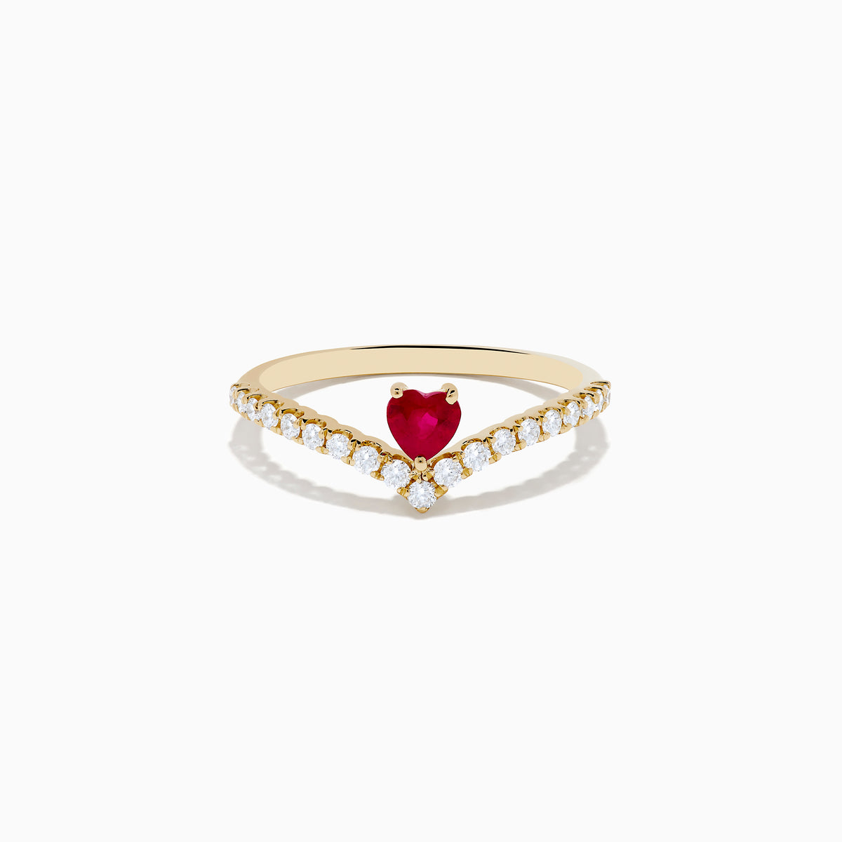 The 14K Yellow Gold Ruby Heart and Diamond Contoured Ring features a V-shaped band set with white diamonds and a vivid ruby heart at its center.