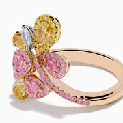 The Trio 18K Three Tone Gold Multi Color Diamond Bouquet Ring showcases overlapping loops with pink, yellow, and white diamonds in a delicate floral-inspired bouquet design.