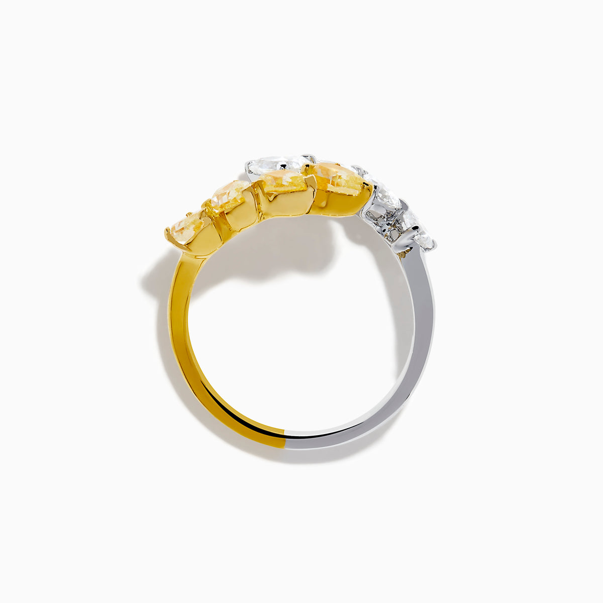 The Canare 18K Two Tone Gold White & Yellow Diamond Bypass Ring showcases three yellow pear-shaped diamonds on one side and three white pears on the other, displayed against a simple white background.