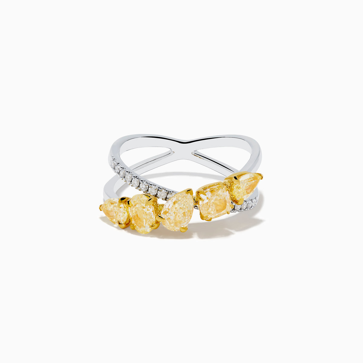 The 18K Two Tone White & Yellow Diamond Criss Cross Ring features a split silver band with five yellow pear-shaped stones on one side and white diamonds on the other, shown against a white background.
