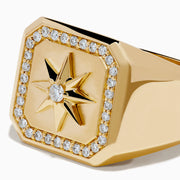 The Men's 14K Yellow Gold Diamond Star Ring features a square face with a starburst design, a central diamond, and a border of small round diamonds—perfect for showcasing refined style.