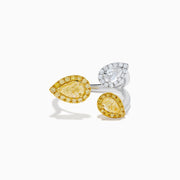 The 18K Two Tone Open Shank Yellow and White Diamond Pear Bouquet Ring features an open band with yellow gemstones bordered by smaller yellow gems and a white gemstone encircled by white diamonds.