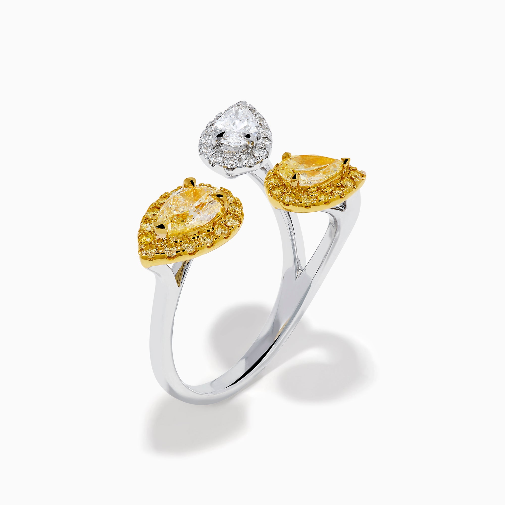 The 18K Two Tone Open Shank Yellow and White Diamond Pear Bouquet Ring features an open band with yellow gemstones bordered by smaller yellow gems and a white gemstone encircled by white diamonds.