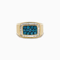 The Men's 14K Yellow Gold Blue Diamond Signet Ring features a rectangular face with clustered blue gems, framed by a baguette-cut white diamond halo.