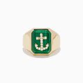 The Men's 14K Yellow Gold Malachite and Diamond Anchor Ring features a rectangular green malachite stone with a diamond-studded anchor at the center, smooth angular edges, and a polished finish.