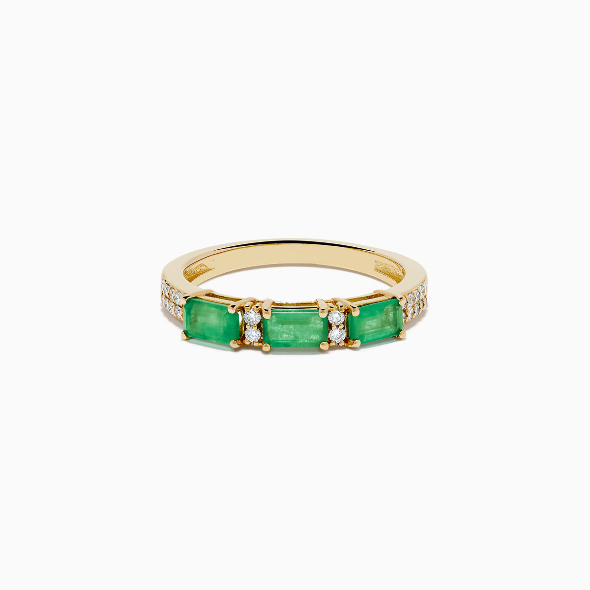 The 14K Yellow Gold Emerald and Diamond Band showcases three rectangular green emeralds set horizontally, each separated by small round diamonds, with extra diamond accents on the sides.