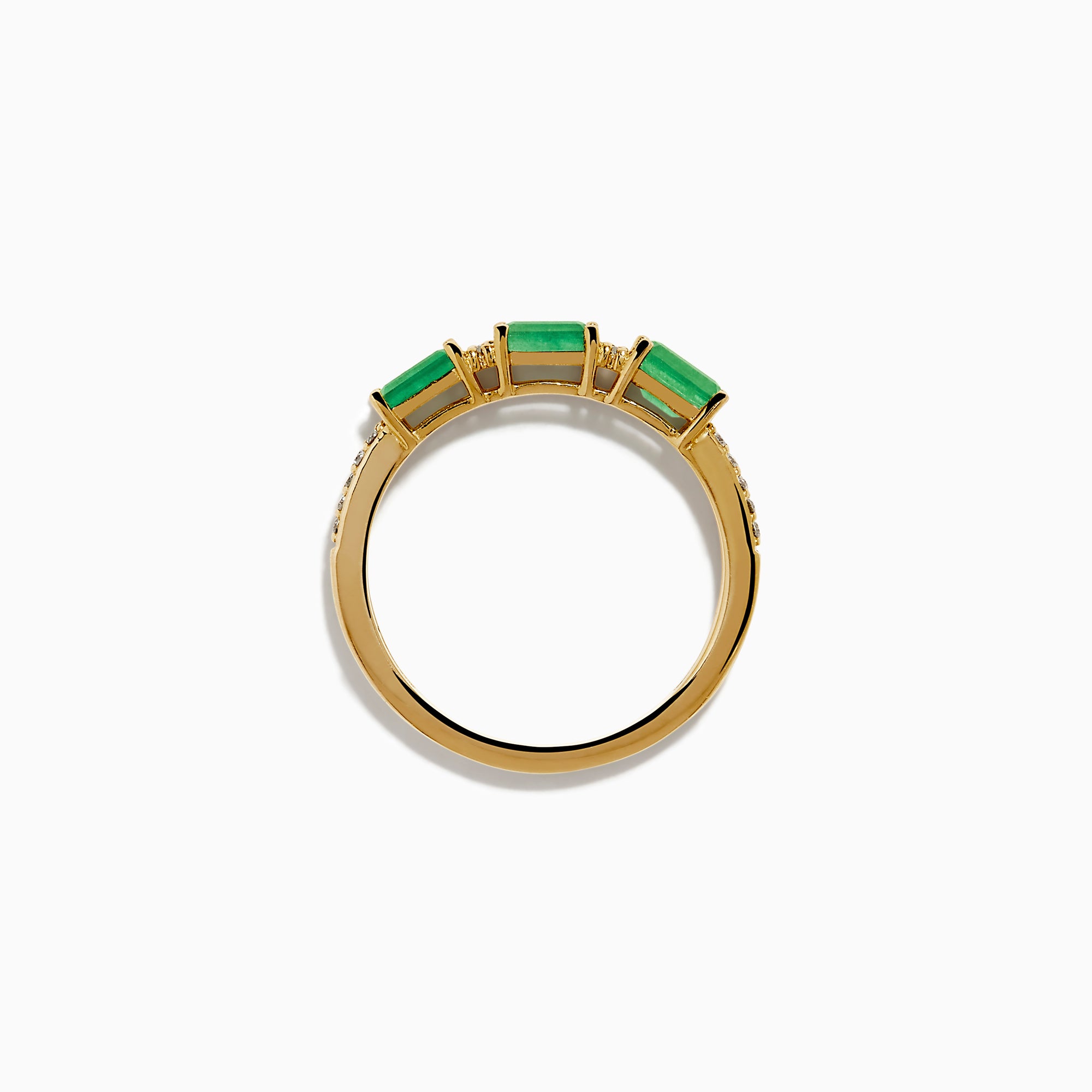 The 14K Yellow Gold Emerald and Diamond Band showcases three rectangular green emeralds set horizontally, each separated by small round diamonds, with extra diamond accents on the sides.