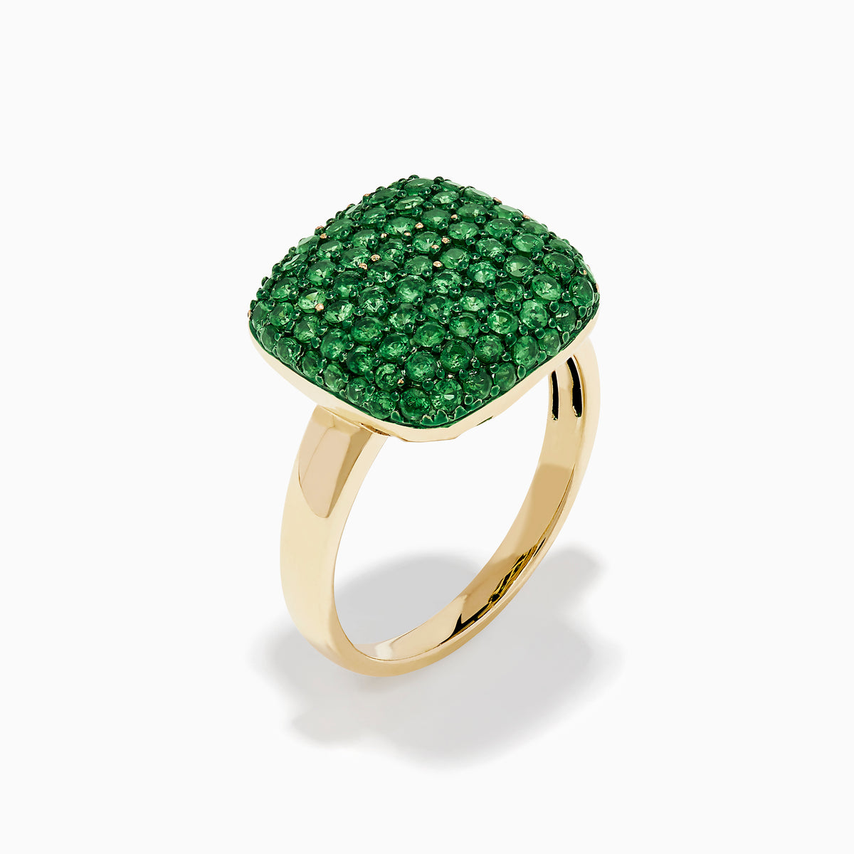 A 14K Yellow Gold Tsavorite Pave Ring with Green Rhodium, featuring a cushion-shaped top set with numerous small green gemstones, is displayed against a white background.