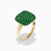 A 14K Yellow Gold Tsavorite Pave Ring with Green Rhodium, featuring a cushion-shaped top set with numerous small green gemstones, is displayed against a white background.