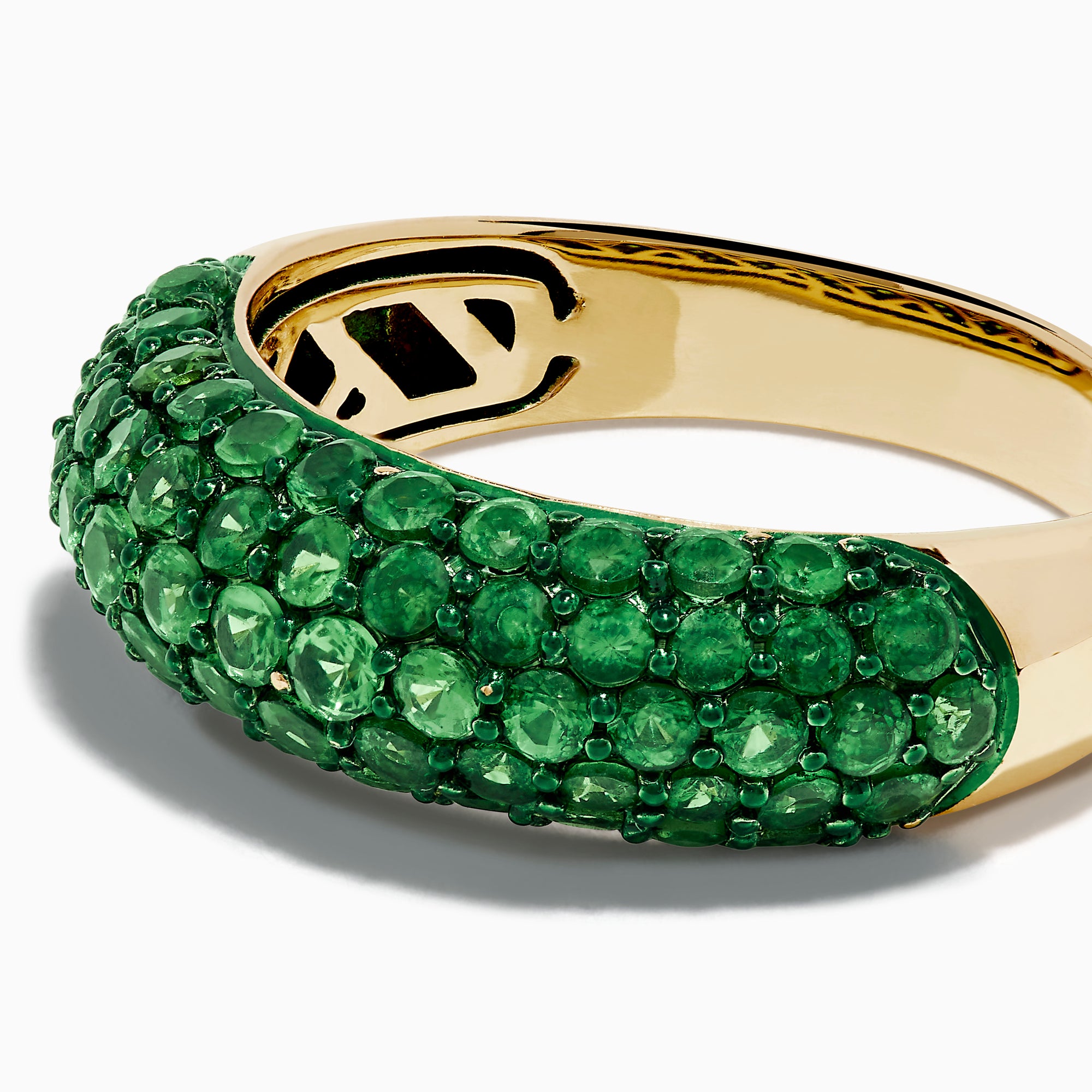 A 14K Yellow Gold Tsavorite Dome Band with Green Rhodium is shown against a plain white background, featuring multiple small, round green gemstones.