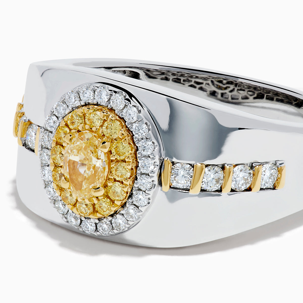 The Men's 18K Two Tone Gold Yellow and White Diamond Signet Ring showcases an oval yellow gemstone at the center, framed by a halo of clear diamonds, with rows of yellow stones along each side of the band.