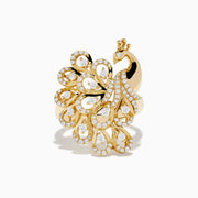The Safari 14K Yellow Gold Diamond Peacock Ring features an intricate peacock design with a diamond-encrusted tail and sparkling accents, elegantly displayed against a plain white background.