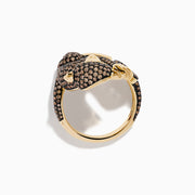 The Espresso 14K Yellow Gold and Black Diamond Monkey Ring features a whimsical monkey with exaggerated eyes and ears, encrusted with brown and black diamonds as it sits clutching its tail—an eye-catching statement piece.