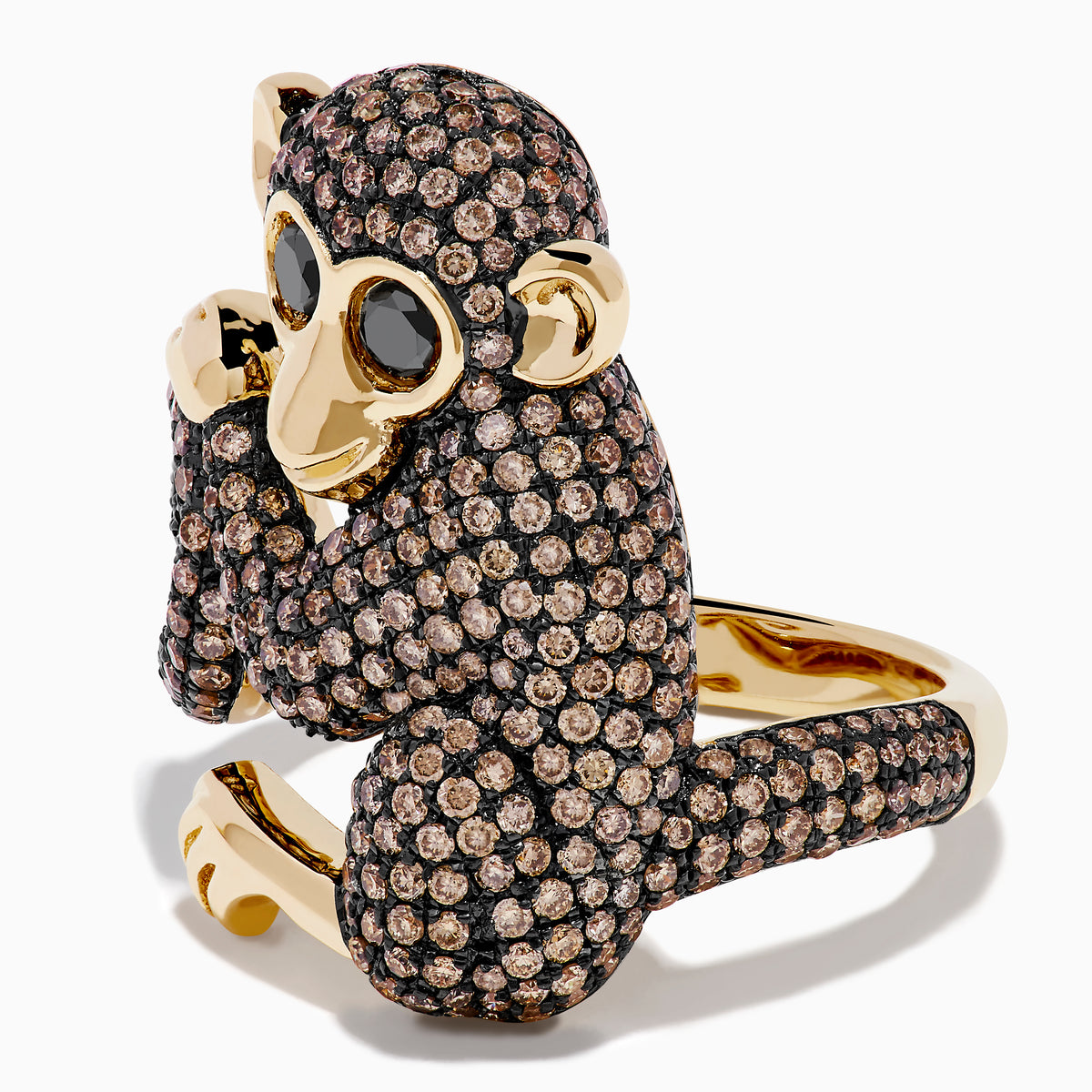 The Espresso 14K Yellow Gold and Black Diamond Monkey Ring features a whimsical monkey with exaggerated eyes and ears, encrusted with brown and black diamonds as it sits clutching its tail—an eye-catching statement piece.