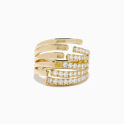 The 14K Yellow Gold Diamond Multi Row Ring features five open, overlapping bands—three set with round diamonds and two in polished gold—for a modern stacked look.