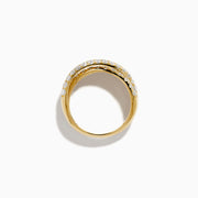 A stack of three 14K Yellow Gold Diamond Pave Crossover Rings, featuring two with diamond pave and wavy crossover design, and one with a grooved, ridged texture, displayed against a white background.