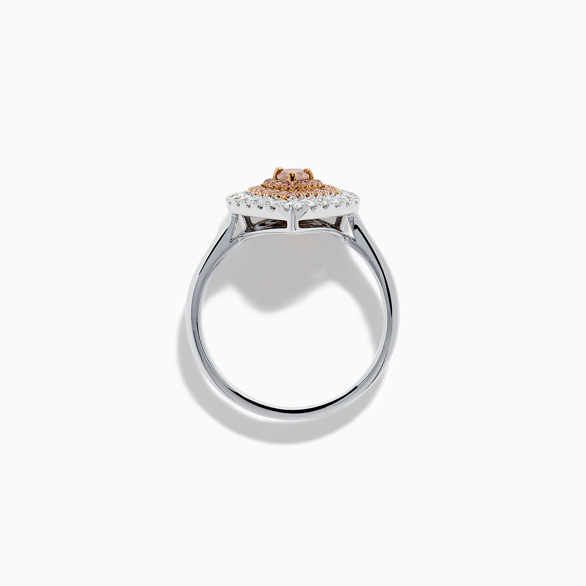 The 18K Two Tone Pear Shape Pink and White Diamond Halo Ring showcases a pear-shaped center, double halos of pink and white diamonds, and a slim two-tone band, set against a white background.