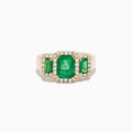 The Brasilica 14K Yellow Gold Emerald and Diamond Ring showcases a striking rectangular green emerald center, two smaller side emeralds, and a sparkling border of white diamonds.