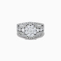 The Bouquet 14K White Gold Diamond Cluster Ring 1.98 TCW features a striking round diamond cluster at the center, accented by additional diamonds on a split shank band for dazzling brilliance.