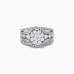 The Bouquet 14K White Gold Diamond Cluster Ring 1.98 TCW features a striking round diamond cluster at the center, accented by additional diamonds on a split shank band for dazzling brilliance.
