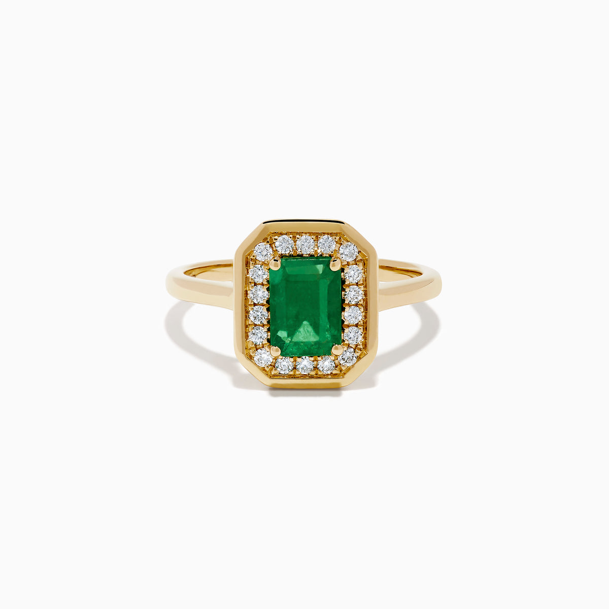 The Brasilica 14K Yellow Gold Emerald and Diamond Ring showcases a rectangular green emerald center, surrounded by a halo of sparkling round white diamonds, all set in yellow gold and displayed on a white background.