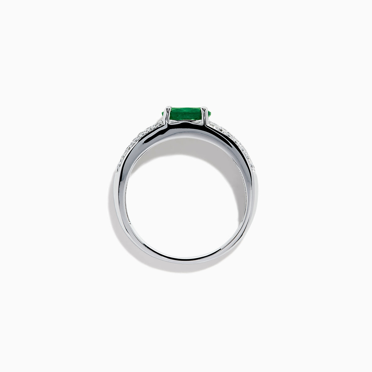The Brasilica 14K White Gold Emerald and Diamond Ring showcases a central oval green emerald with three rows of round diamonds on each side, set in white gold and shown against a white background.