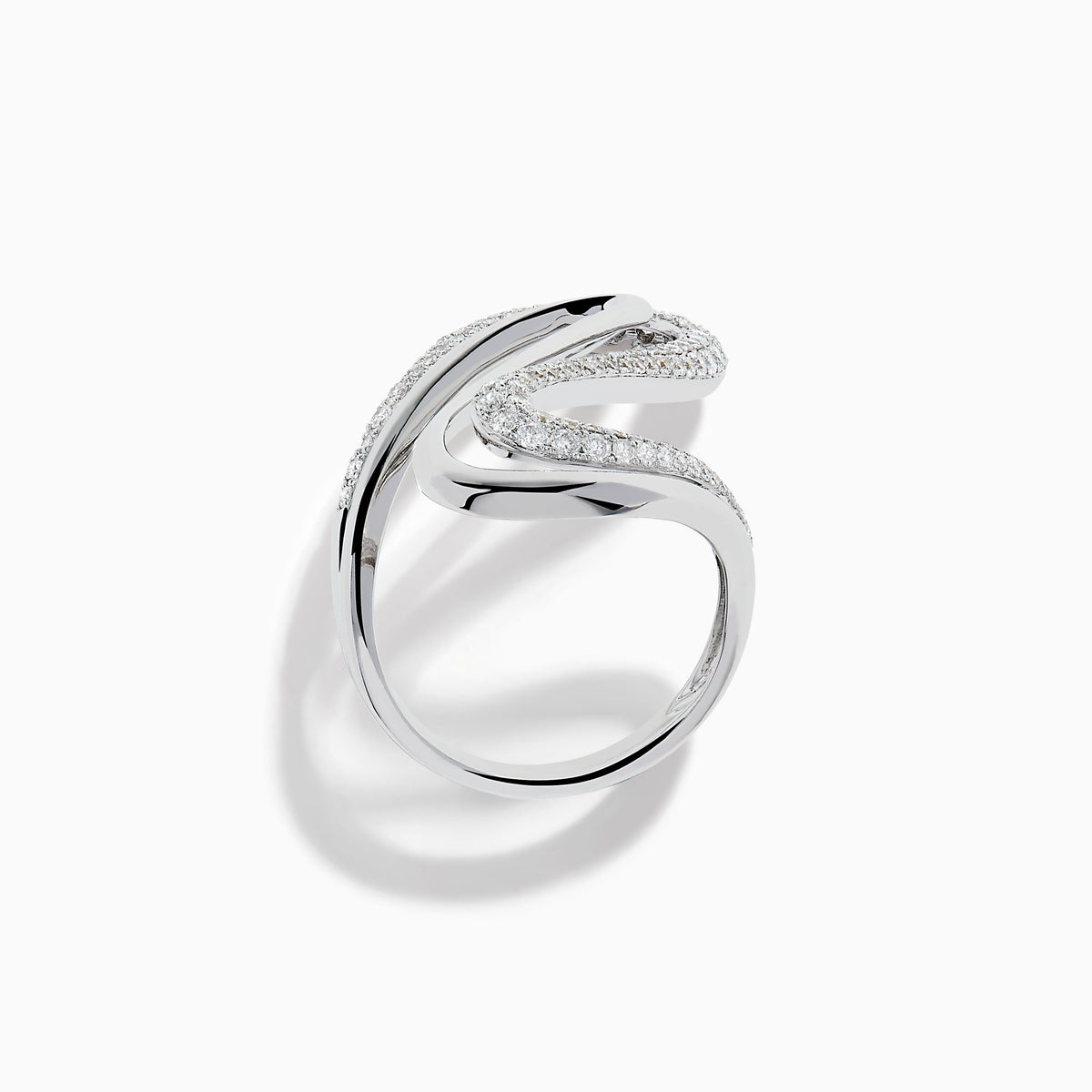 The 14K White Gold Diamond Open S-Curve Statement Ring showcases an elegant swirling open design with sparkling diamonds, displayed against a white background.