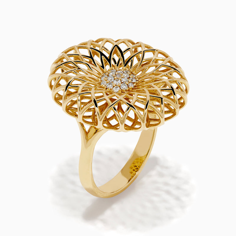 The 14K Yellow Gold Diamond Filigree Sunburst Statement Ring showcases a layered floral design with central sparkling diamonds, capturing the look of a blooming sunburst flower.